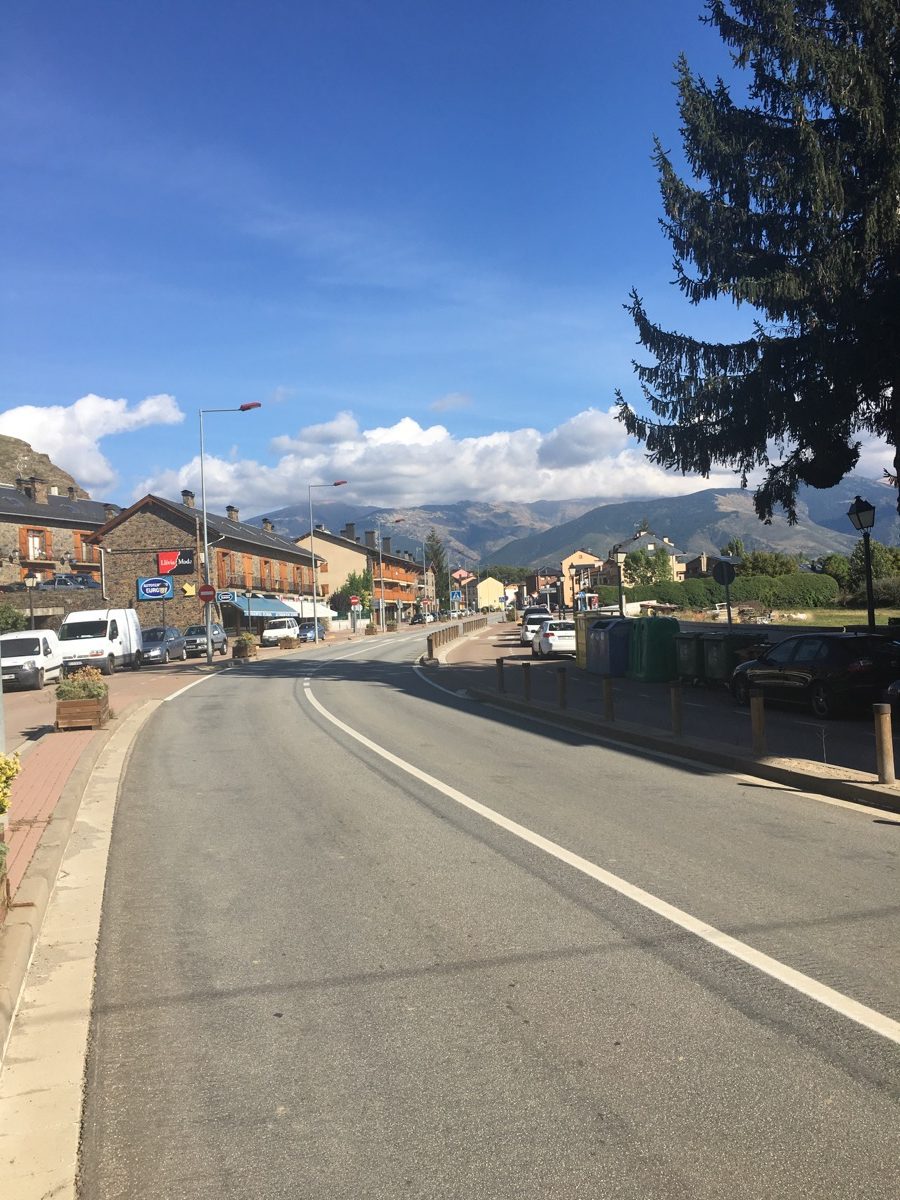 Llívia street with mountains in background